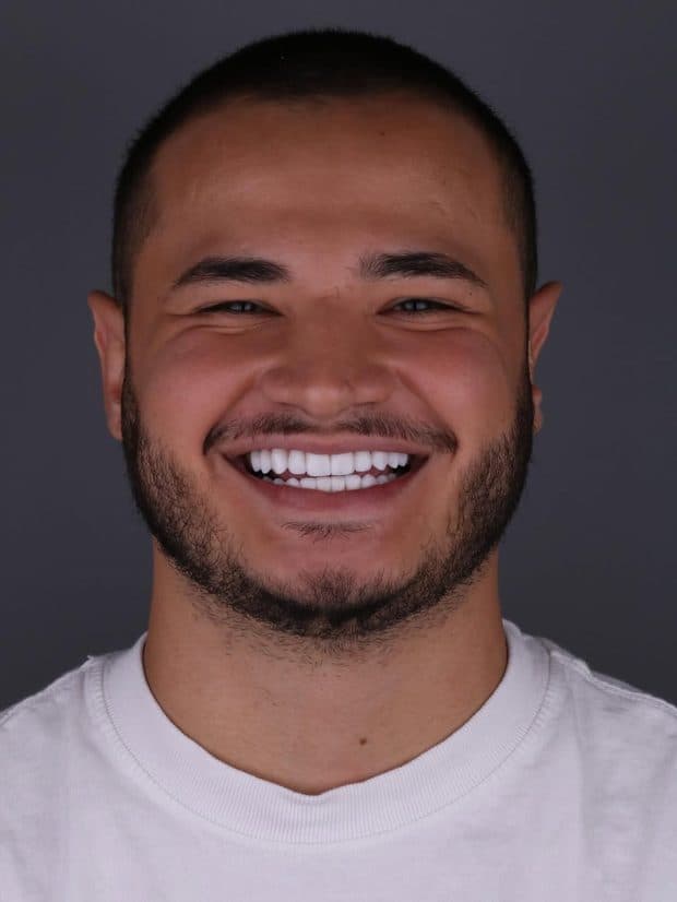 Paciente da Clínica New Concept sorrindo